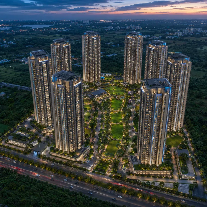 Aerial view of the eight-tower community around the central green — Sattva Varthur Road