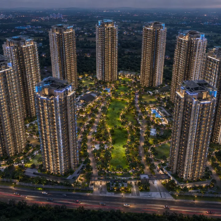 Eight-tower skyline illuminated at night — Sattva Varthur Road